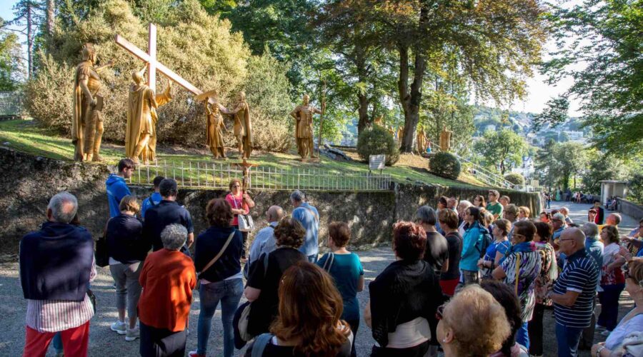 cross at lourdes france pilgrimage tour