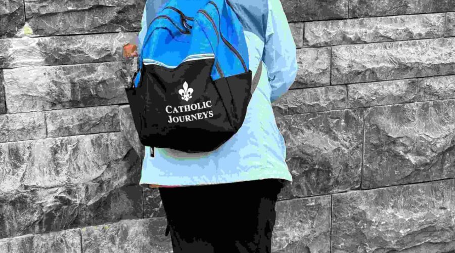 lourdes holy water person pilgrimage tour