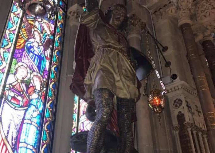 stained glass montserrat with statue