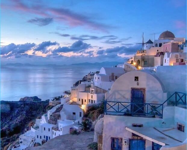 santorini at dusk greece food and faith pilgrimage tour