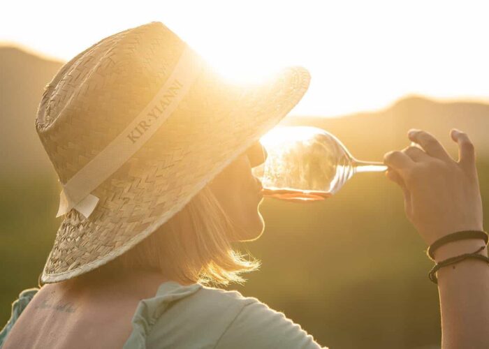 woman drinking wine pilgrimage